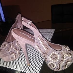 Heels that are made by Kiss & Tell. Size 6.5